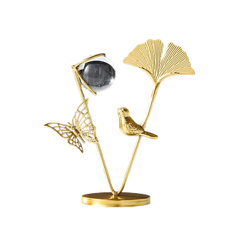 Objeto de metal com bolinha de vidro p/mesa